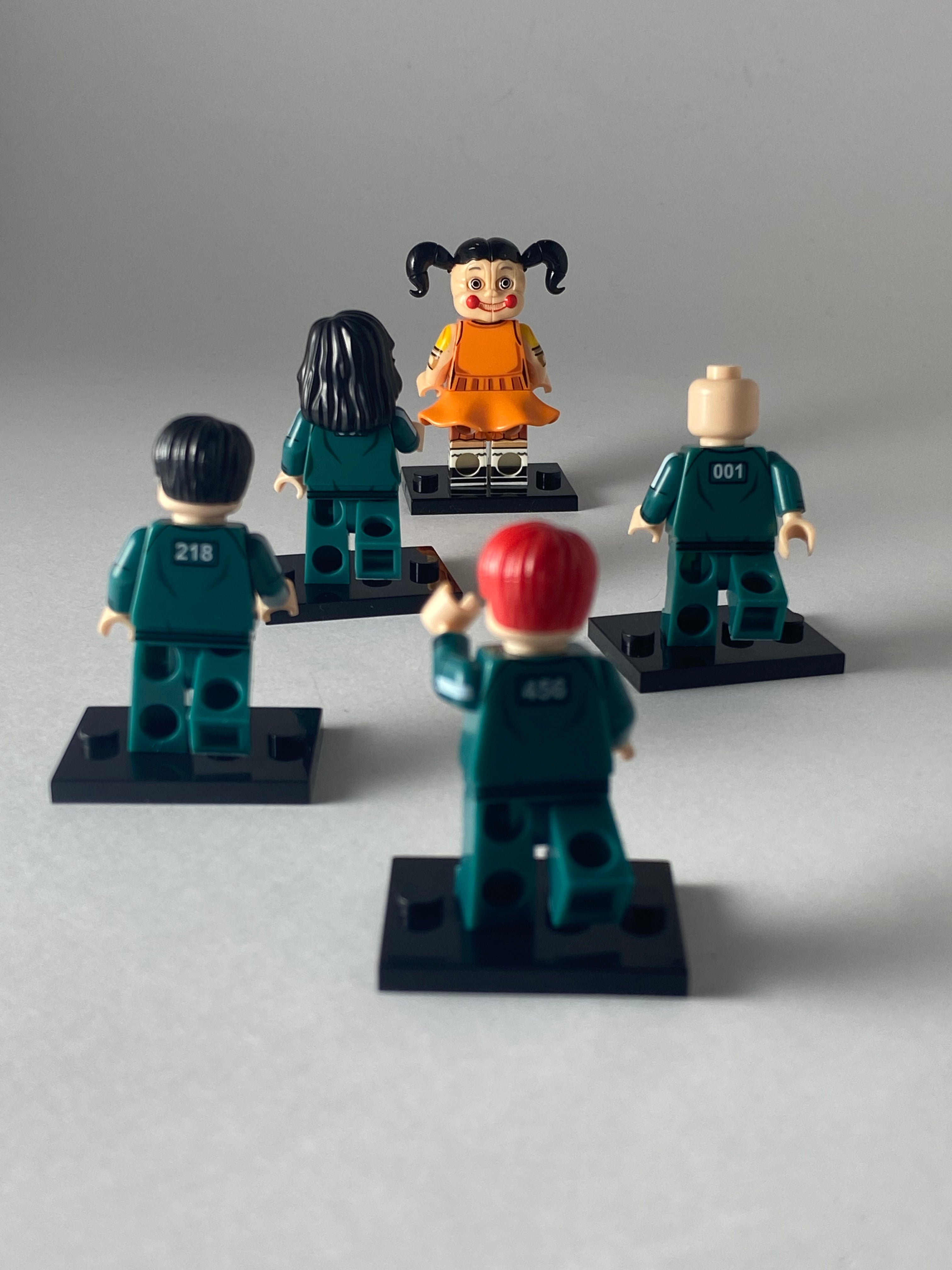 Squid Game Players and Doll