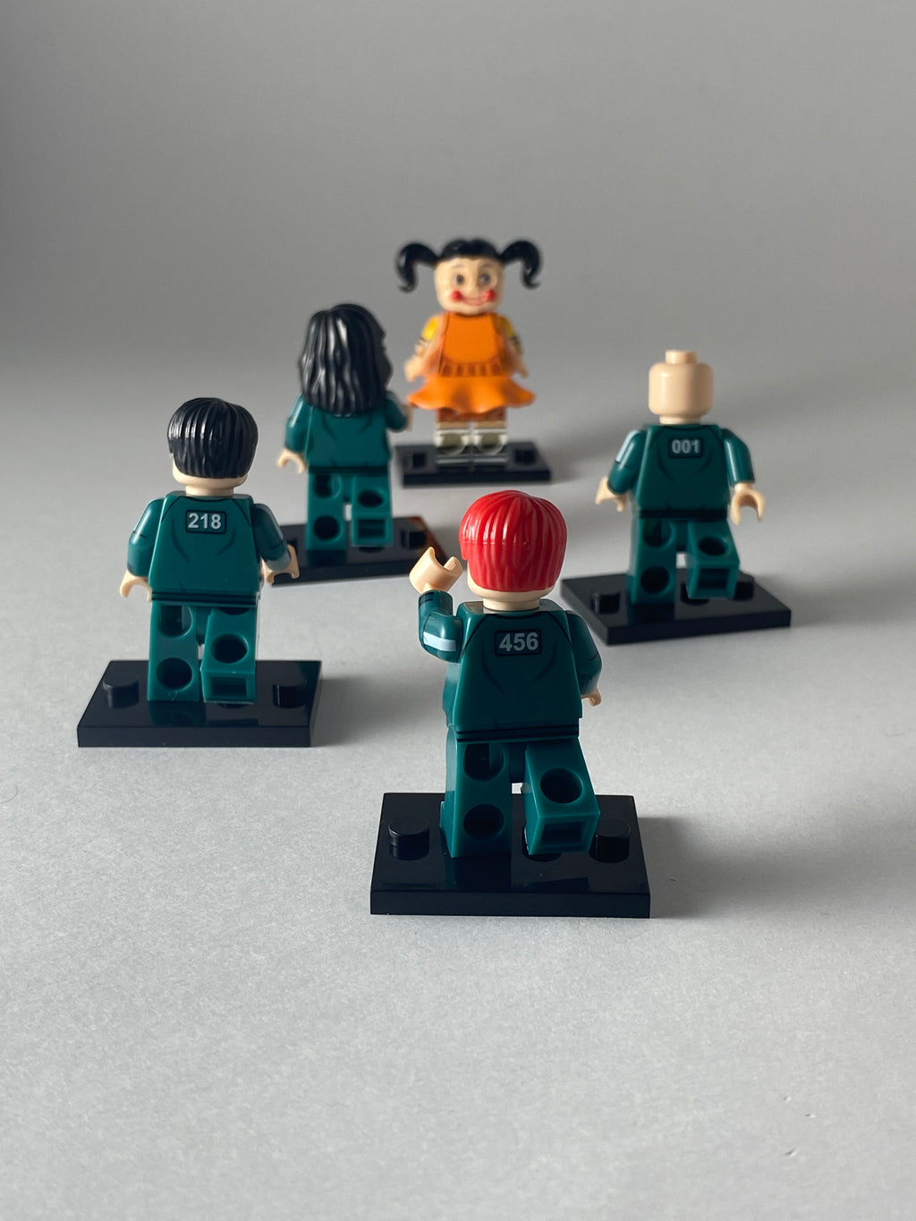 Squid Game Players and Doll