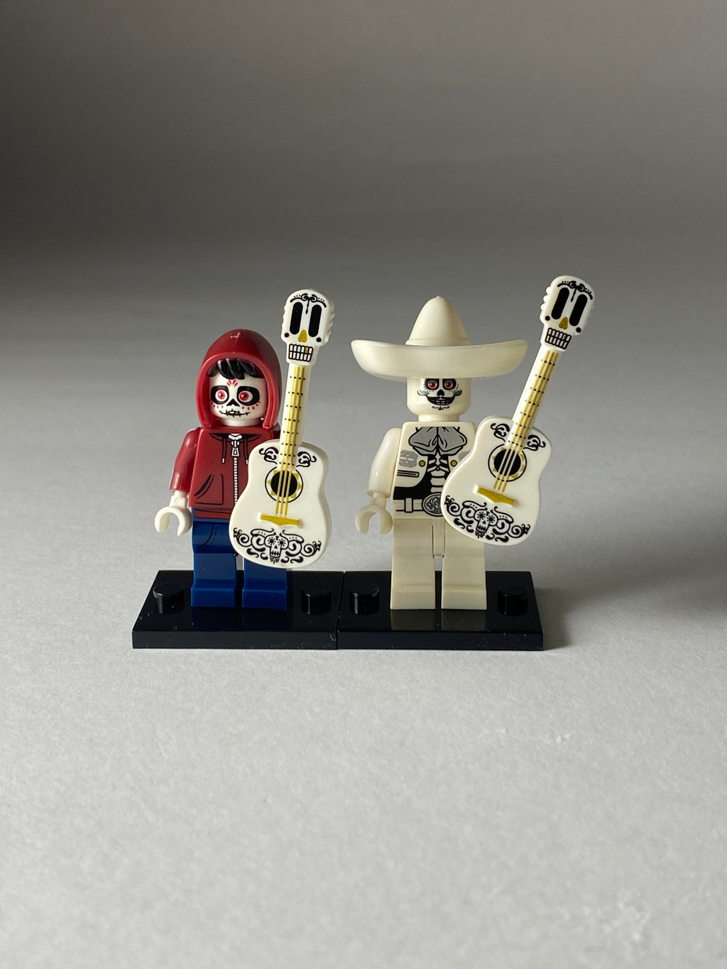 Miguel Rivera and Ernesto de la Cruz